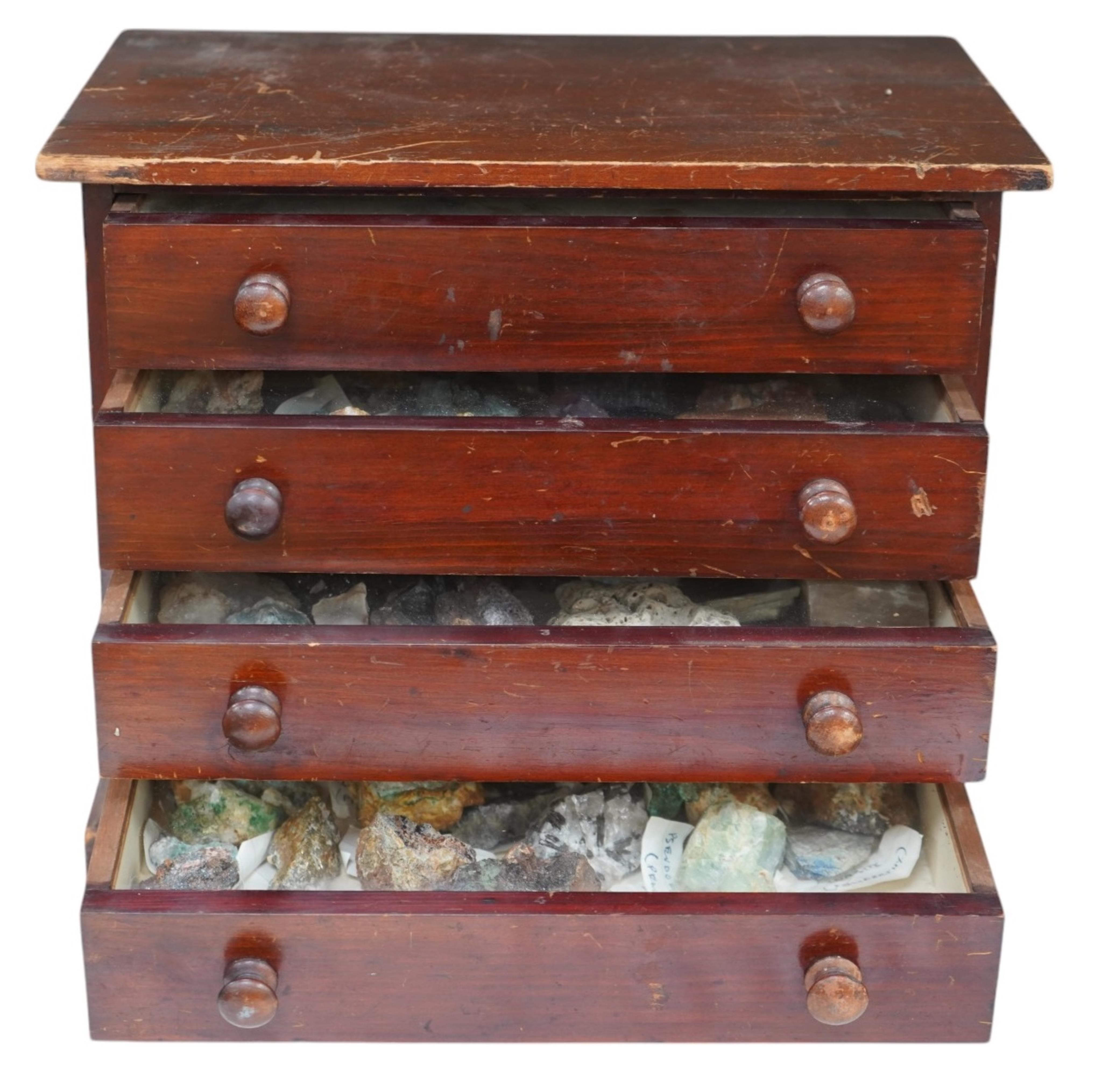 An early 20th century collector’s chest fitted with four drawers filled with mineral specimens and butterflies to include Haematite, Scorodite and Pyrite, 30cm high. Condition - fair